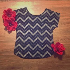 Chevron (zig zac stripe) pattern shirt.